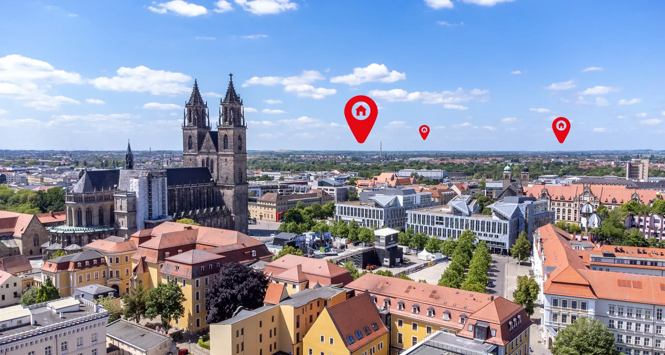 Stadtansicht von Magdeburg mit Wegweisern zu Wohnungen